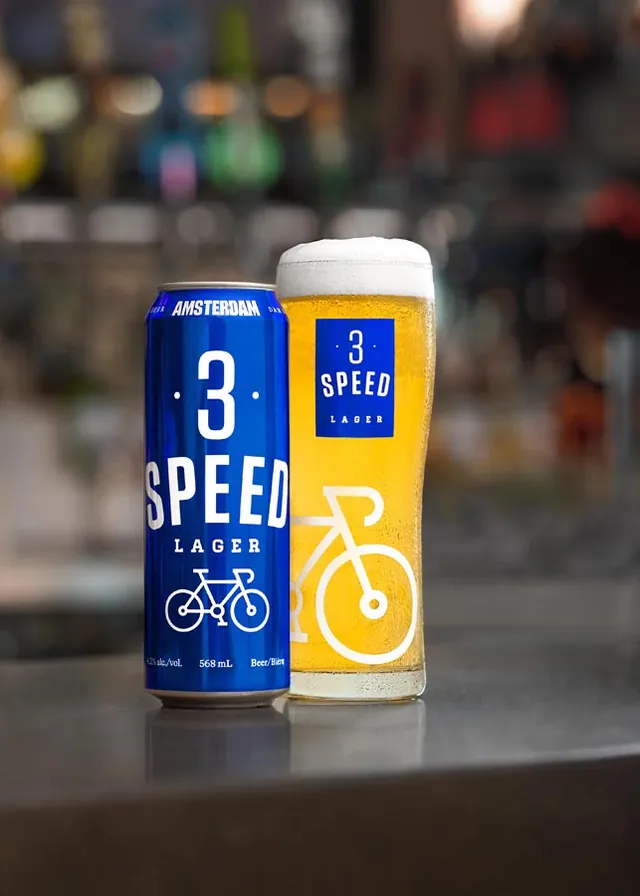 Canned beverage styled in a lifestyle setting