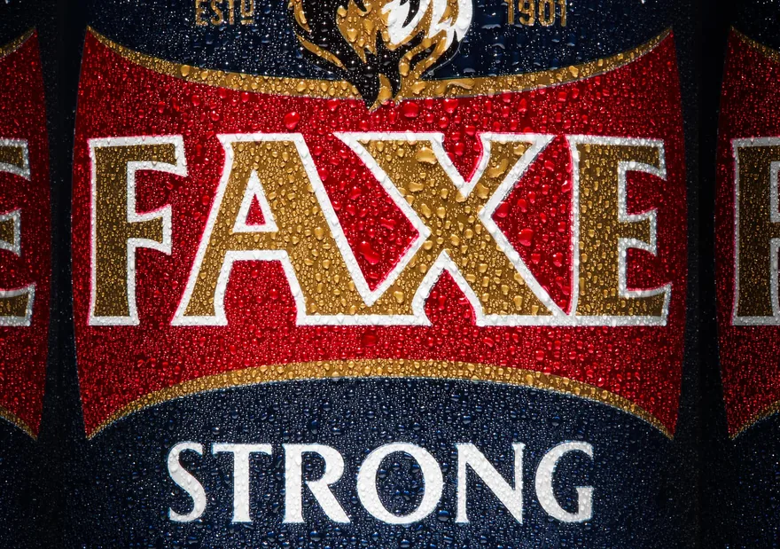 Faxe Strong lager can in close-up detail with condensation, beverage product photography, Toronto